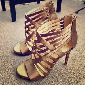 4 inch Bronze stilettos, size 7.